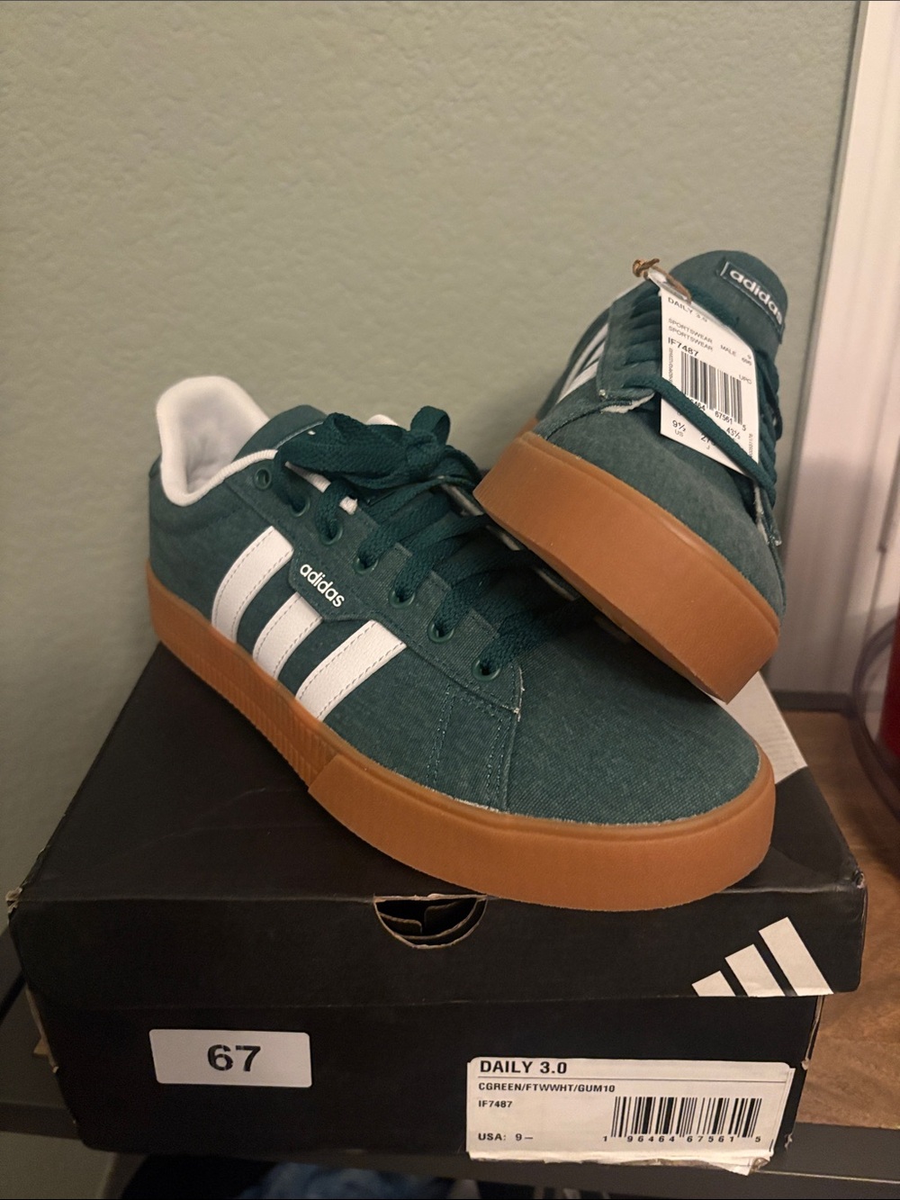 adidas Dark Green Low-Top Sneakers with White Stripes and Gum Sole